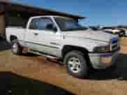 1999 Dodge 1500 с VIN 3B7HF13ZXXG101277, выставлен на аукционе Copart как лот 77341064 с пробегом 156 999 миль миль и Списание • Salvage title. История ставок и продаж доступна на DreamBid. Изображение 4.