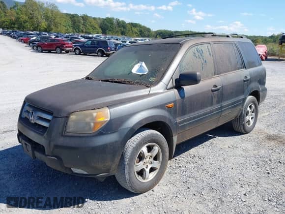 2006 Honda Pilot EX-L z VIN 5FNYF18536B021412, wystawiony jako IAAI lot #43249005 z przebiegiem 181 343 mil mil oraz . Historia ofert i sprzedaży dostępna na DreamBid. Obrazek 6.