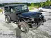 1992 Jeep Wrangler with VIN 2J4FY29S0NJ550114, listed as a Copart auction lot 68966325 with 142,331 mi miles and Salvage title. Bid and sale history available at DreamBid. Image 13.