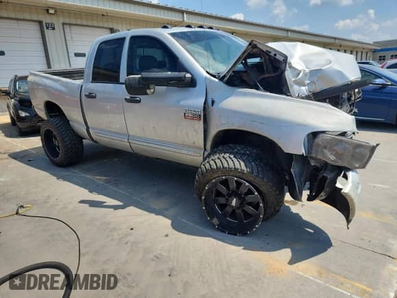2004 Dodge 2500 SLT with VIN 3D7KU28C74G278554, listed as a Copart auction lot 62395095 with 235,184 mi miles and Salvage title. Bid and sale history available at DreamBid. Image 4.