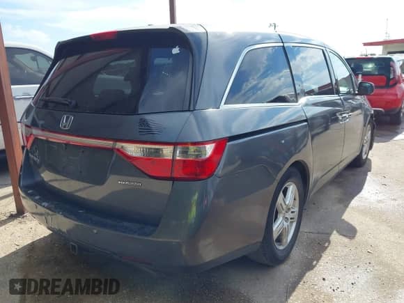 2011 Honda Odyssey Touring с VIN 5FNRL5H96BB016092, выставлен на аукционе IAAI как лот 43425324 с пробегом 188 309 миль миль и . История ставок и продаж доступна на DreamBid. Изображение 4.