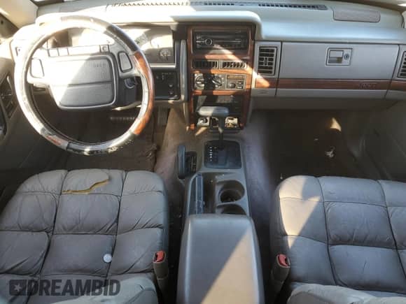 1995 Jeep Grand Cherokee Limited with VIN 1J4GZ78Y8SC709259, listed as a Copart auction lot 42639465 with 194,473 mi miles and Salvage title. Bid and sale history available at DreamBid. Image 8.