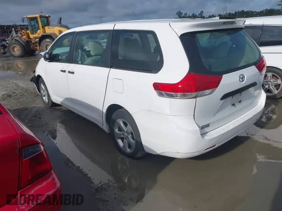 2012 Toyota Sienna with VIN 5TDZK3DC8CS180806, listed as a IAAI auction lot 42401264 with 201,007 mi miles and . Bid and sale history available at DreamBid. Image 3.