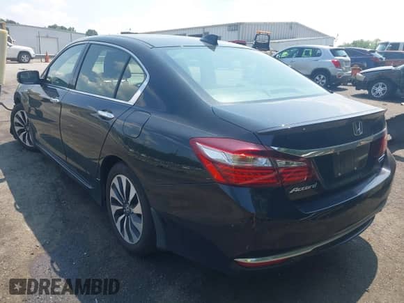 2017 Honda Accord Touring with VIN JHMCR6F74HC005706, listed as a IAAI auction lot 42585878 with 158,388 mi miles and . Bid and sale history available at DreamBid. Image 3.
