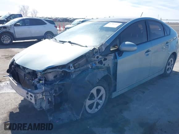 2013 Toyota Prius One with VIN JTDKN3DU7D1734725, listed as a IAAI auction lot 41702527 with 188,983 mi miles and . Bid and sale history available at DreamBid. Image 2.