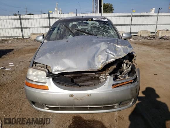 2004 Chevrolet Aveo z VIN KL1TD52634B241343, wystawiony jako Copart lot #71680264 z przebiegiem Nie podano mil oraz Szkoda całkowita • Salvage title. Historia ofert i sprzedaży dostępna na DreamBid. Obrazek 5.