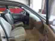 1993 Toyota Camry LE z VIN JT2SK12E0P0169424, wystawiony jako IAAI lot #42255919 z przebiegiem 173 286 mil mil oraz . Historia ofert i sprzedaży dostępna na DreamBid. Obrazek 5.