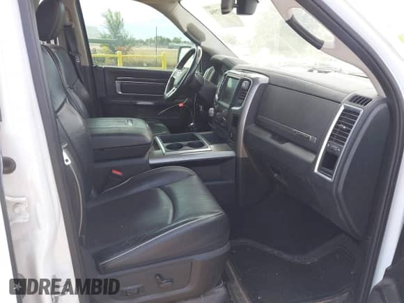 2014 Ram 1500 Longhorn z VIN 1C6RR7PTXES318846, wystawiony jako IAAI lot #43147594 z przebiegiem 164 180 mil mil oraz . Historia ofert i sprzedaży dostępna na DreamBid. Obrazek 5.