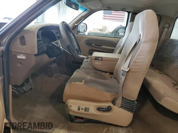 2001 Dodge 1500 z VIN 3B7HC13ZX1G202500, wystawiony jako Copart lot #69653765 z przebiegiem 155 949 mil mil oraz Szkoda całkowita • Salvage title. Historia ofert i sprzedaży dostępna na DreamBid. Obrazek 7.