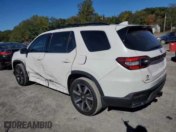 2023 Honda Pilot Touring с VIN 5FNYG1H70PB014840, выставлен на аукционе Copart как лот 85300455 с пробегом 32 981 миль миль и Списание • Salvage title. История ставок и продаж доступна на DreamBid. Изображение 2.