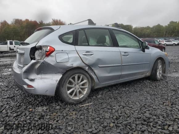 2013 Subaru Impreza Premium with VIN JF1GPAC61DH814669, listed as a Copart auction lot 85670105 with 210,000 mi miles and Salvage title. Bid and sale history available at DreamBid. Image 3.