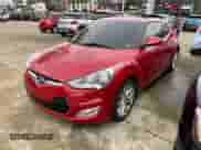 2015 Hyundai Veloster z VIN KMHTC6AD0FU238274, wystawiony jako Copart lot #45174464 z przebiegiem 143 112 mil mil oraz . Historia ofert i sprzedaży dostępna na DreamBid. Obrazek 2.