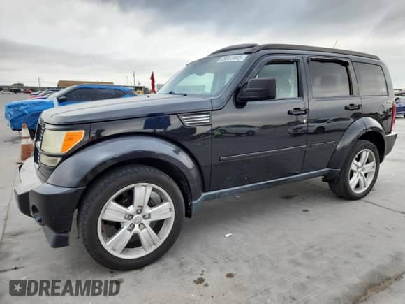 2011 Dodge Nitro Heat with VIN 1D4PU4GXXBW537684, listed as a Copart auction lot 89861445 with 100,138 mi miles and Clean title. Bid and sale history available at DreamBid. Image 1.