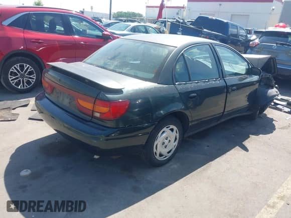 2001 Saturn SL with VIN 1G8ZK527X1Z238857, listed as a IAAI auction lot 42460370 with 76,231 mi miles and . Bid and sale history available at DreamBid. Image 4.