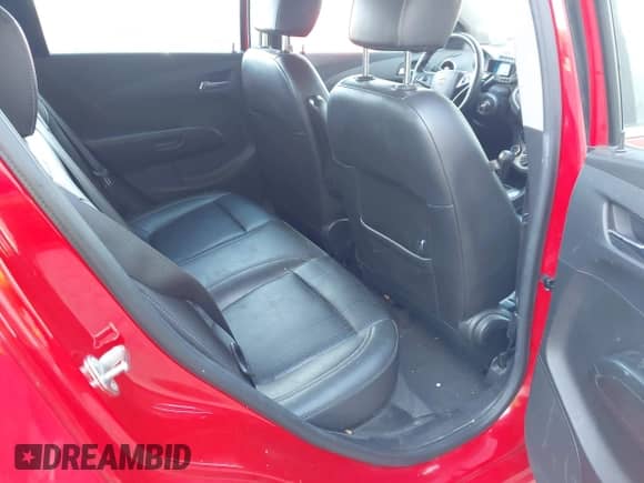 2015 Chevrolet Sonic LTZ z VIN 1G1JE6SB5F4130115, wystawiony jako IAAI lot #43557075 z przebiegiem 139 982 mil mil oraz . Historia ofert i sprzedaży dostępna na DreamBid. Obrazek 8.