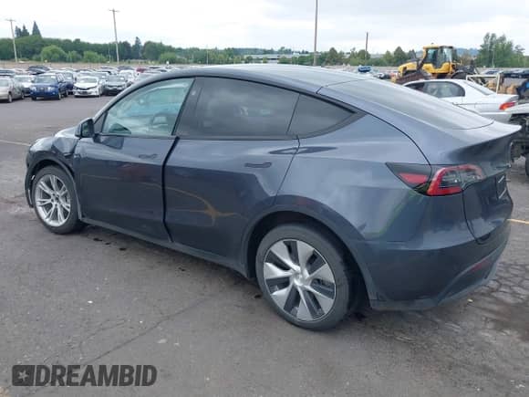 2023 Tesla Model Y Long Range with VIN 7SAYGDEE4PF806349, listed as a IAAI auction lot 42217660 with 39,898 mi miles and . Bid and sale history available at DreamBid. Image 3.