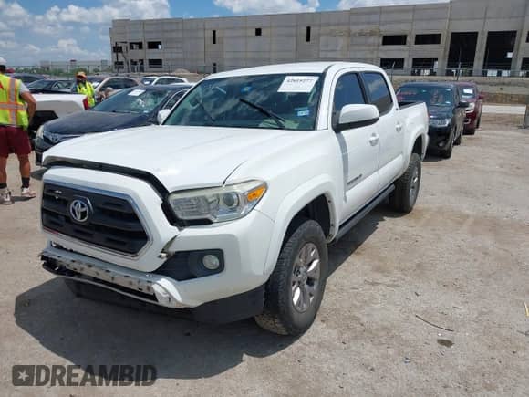 2017 Toyota Tacoma SR5 with VIN 5TFAZ5CN8HX022958, listed as a IAAI auction lot 42615277 with 103,173 mi miles and . Bid and sale history available at DreamBid. Image 2.