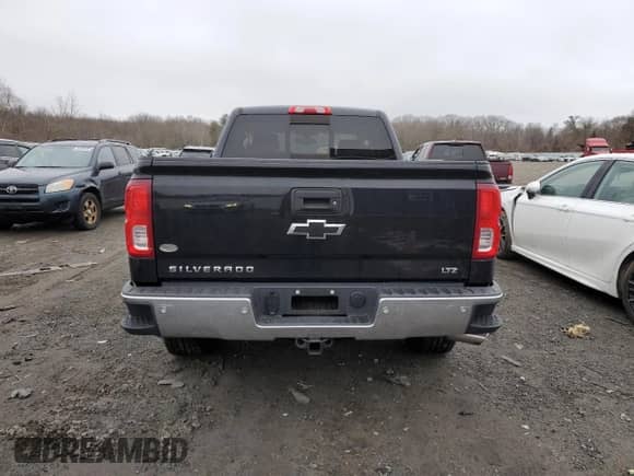 2016 Chevrolet Silverado 1500 LTZ with VIN 1GCVKSEC9GZ394232, listed as a Copart auction lot 42374525 with 106,828 mi miles and Salvage title. Bid and sale history available at DreamBid. Image 6.