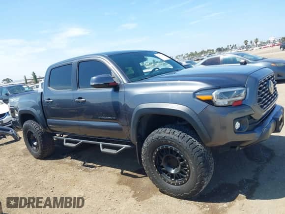 2021 Toyota Tacoma SR with VIN 3TMCZ5AN3MM450562, listed as a IAAI auction lot 43071461 with 15,850 mi miles and . Bid and sale history available at DreamBid. Image 13.