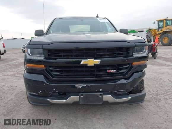 2017 Chevrolet Silverado 1500 LT z VIN 1GCUKREC2HF208232, wystawiony jako IAAI lot #40933445 z przebiegiem 105 928 mil mil oraz . Historia ofert i sprzedaży dostępna na DreamBid. Obrazek 12.