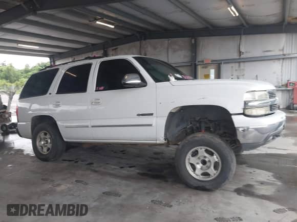 2002 Chevrolet Tahoe LT with VIN 1GNEC13Z92R235435, listed as a IAAI auction lot 42764198 with 248,194 mi miles and . Bid and sale history available at DreamBid. Image 12.