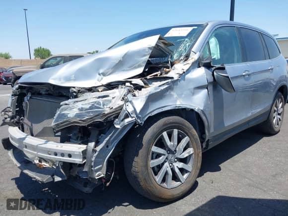 2020 Honda Pilot EX-L with VIN 5FNYF5H54LB015931, listed as a IAAI auction lot 42643916 with 54,617 mi miles and . Bid and sale history available at DreamBid. Image 2.