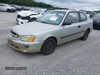 2002 Hyundai Accent with VIN KMHCF35G12U230303, listed as a IAAI auction lot 42969384 with 137,565 mi miles and . Bid and sale history available at DreamBid. Image 2.