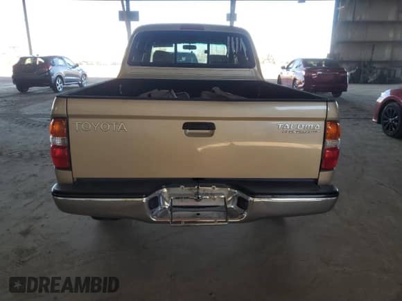 2001 Toyota Tacoma PreRunner z VIN 5TEGN92N71Z859665, wystawiony jako Copart lot #84799325 z przebiegiem 202 008 mil mil oraz Szkoda całkowita • Salvage title. Historia ofert i sprzedaży dostępna na DreamBid. Obrazek 6.