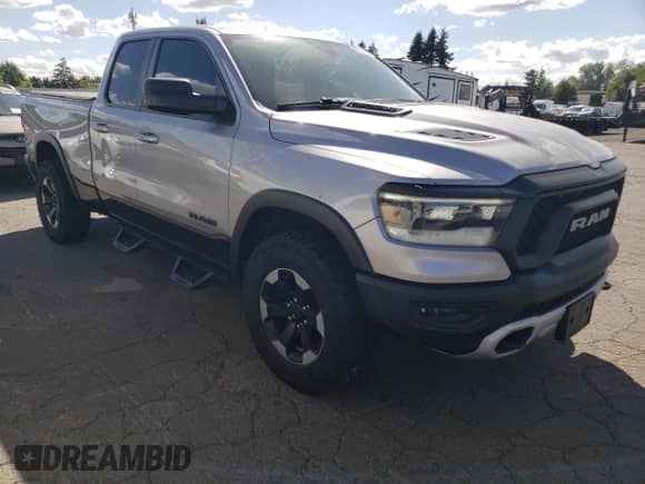 2020 Ram 1500 Rebel with VIN 1C6SRFET2LN281804, listed as a Copart auction lot 63704155 with 102,975 mi miles and Salvage title. Bid and sale history available at DreamBid. Image 4.