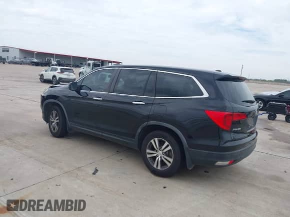 2017 Honda Pilot EX-L with VIN 5FNYF5H57HB027160, listed as a IAAI auction lot 42354810 with 105,251 mi miles and . Bid and sale history available at DreamBid. Image 3.