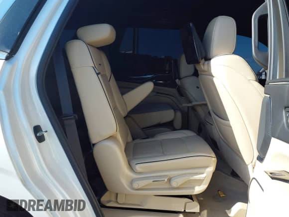 2021 Cadillac Escalade Premium Luxury with VIN 1GYS4BKLXMR394649, listed as a IAAI auction lot 41474731 with 85,268 mi miles and . Bid and sale history available at DreamBid. Image 8.