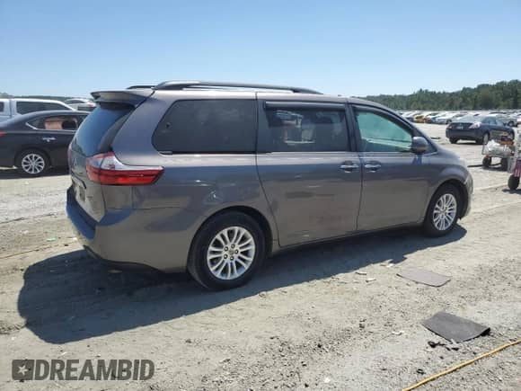 2015 Toyota Sienna XLE with VIN 5TDYK3DC9FS642659, listed as a Copart auction lot 70899615 with 147,363 mi miles and Salvage title. Bid and sale history available at DreamBid. Image 3.