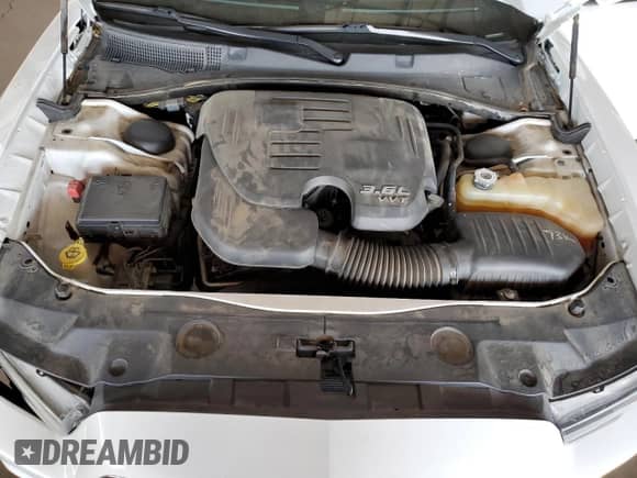 2014 Dodge Charger SE with VIN 2C3CDXBG4EH349500, listed as a Copart auction lot 66215345 with 114,011 mi miles and Salvage title. Bid and sale history available at DreamBid. Image 11.