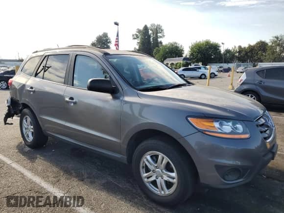 2010 Hyundai Santa Fe GLS z VIN 5NMSG3AB6AH379299, wystawiony jako Copart lot #65987014 z przebiegiem 134 917 mil mil oraz Szkoda całkowita • Salvage title. Historia ofert i sprzedaży dostępna na DreamBid. Obrazek 4.