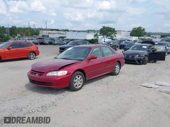 2002 Honda Accord SE z VIN 1HGCG66802A029229, wystawiony jako IAAI lot #42974340 z przebiegiem 150 649 mil mil oraz . Historia ofert i sprzedaży dostępna na DreamBid. Obrazek 17.