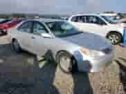 2003 Toyota Camry LE with VIN 4T1BF30K43U544407, listed as a Copart auction lot 82562555 with 151,975 mi miles and Salvage title. Bid and sale history available at DreamBid. Image 4.