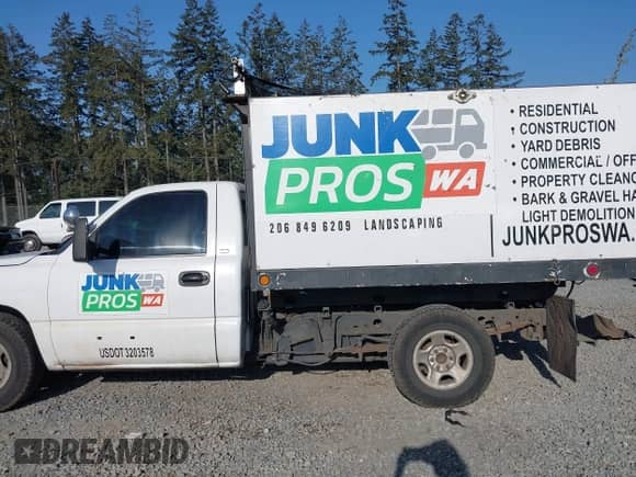 2001 GMC Sierra 1500 SLE with VIN 1GTEC14V21E285975, listed as a IAAI auction lot 42095410 with 101,285 mi miles and . Bid and sale history available at DreamBid. Image 14.