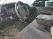 1999 Dodge RAM with VIN 3B7KC2266XG132392, listed as a Copart auction lot 50414255 with 291,862 mi miles and Salvage title. Bid and sale history available at DreamBid. Image 8.