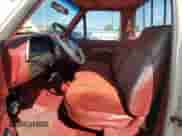 1990 Ford F-150 z VIN 1FTDF15Y5LPA89323, wystawiony jako Copart lot #62608275 z przebiegiem 86 922 mil mil oraz Czysty tytuł • Clean title. Historia ofert i sprzedaży dostępna na DreamBid. Obrazek 7.