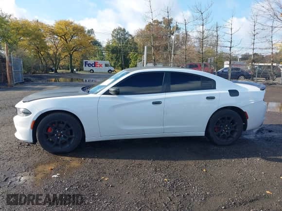 2015 Dodge Charger SE with VIN 2C3CDXFG9FH848644, listed as a IAAI auction lot 43467135 with 150,468 mi miles and . Bid and sale history available at DreamBid. Image 14.