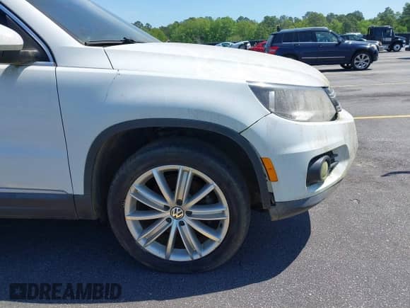 2015 Volkswagen Tiguan S with VIN WVGAV7AX4FW506314, listed as a IAAI auction lot 42063584 with 143,939 mi miles and . Bid and sale history available at DreamBid. Image 18.
