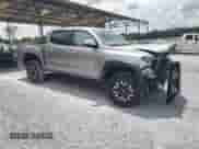 2020 Toyota Tacoma SR5 с VIN 5TFAZ5CN1LX090978, выставлен на аукционе Copart как лот 64010265 с пробегом 117 433 миль миль и Списание • Salvage title. История ставок и продаж доступна на DreamBid. Изображение 4.