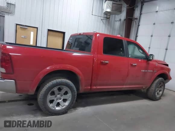 2011 Ram 1500 Big Horn with VIN 1D7RV1CT5BS620621, listed as a IAAI auction lot 40786229 with 118,179 mi miles and . Bid and sale history available at DreamBid. Image 13.