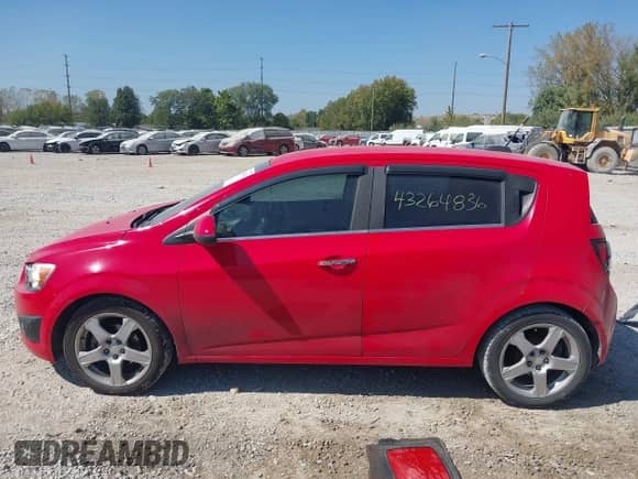 2015 Chevrolet Sonic LTZ with VIN 1G1JE6SBXF4103136, listed as a IAAI auction lot 43264836 with 138,290 mi miles and . Bid and sale history available at DreamBid. Image 13.