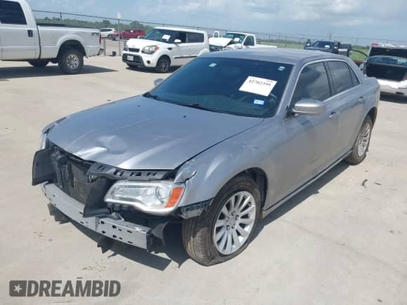 2013 Chrysler 300 with VIN 2C3CCAAG9DH727908, listed as a IAAI auction lot 42702399 with 105,987 mi miles and . Bid and sale history available at DreamBid. Image 6.