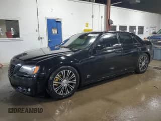 2012 Chrysler 300 S z VIN 2C3CCAJT9CH163883, wystawiony jako Copart lot #87398855 z przebiegiem 215 398 mil mil oraz Czysty tytuł • Clean title. Historia ofert i sprzedaży dostępna na DreamBid. Obrazek 1.