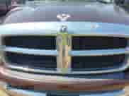2004 Dodge 1500 SLT with VIN 1D7HA18D14J140299, listed as a IAAI auction lot 42974467 with 165,780 mi miles and . Bid and sale history available at DreamBid. Image 6.