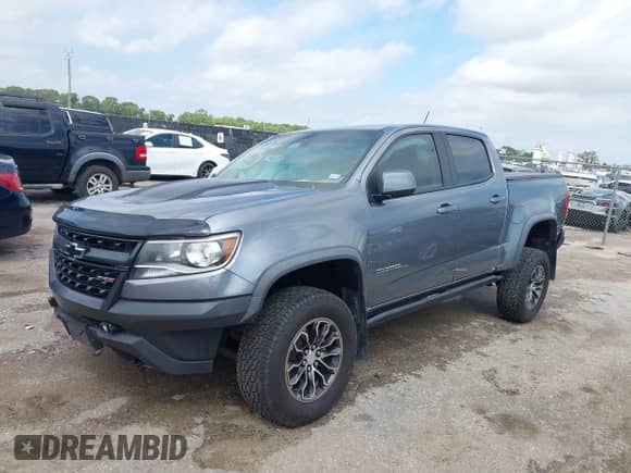 2019 Chevrolet Colorado 4WD ZR2 z VIN 1GCGTEEN4K1359257, wystawiony jako IAAI lot #43271999 z przebiegiem 85 014 mil mil oraz . Historia ofert i sprzedaży dostępna na DreamBid. Obrazek 17.