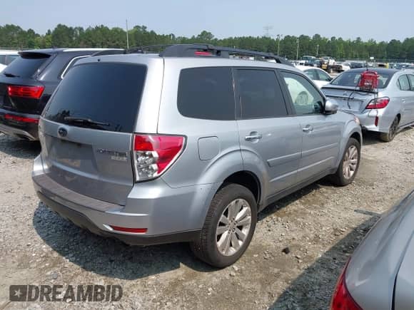 2013 Subaru Forester X Limited with VIN JF2SHAEC2DH441521, listed as a IAAI auction lot 42397403 with 130,000 mi miles and . Bid and sale history available at DreamBid. Image 4.