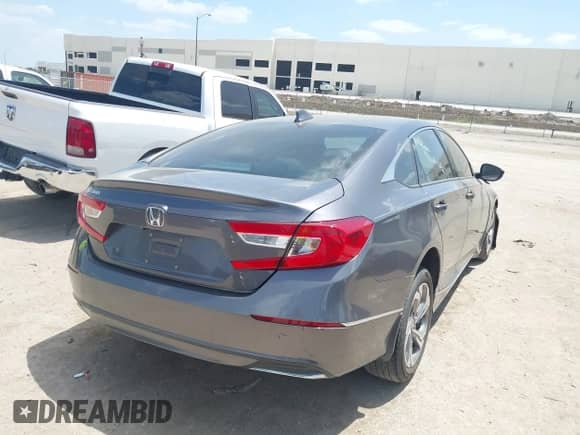 2018 Honda Accord EX-L with VIN 1HGCV1F54JA023057, listed as a IAAI auction lot 42850251 with 60,802 mi miles and . Bid and sale history available at DreamBid. Image 4.